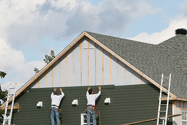 Professional Storm Damage Siding Repair technician working in West Mifflin, PA